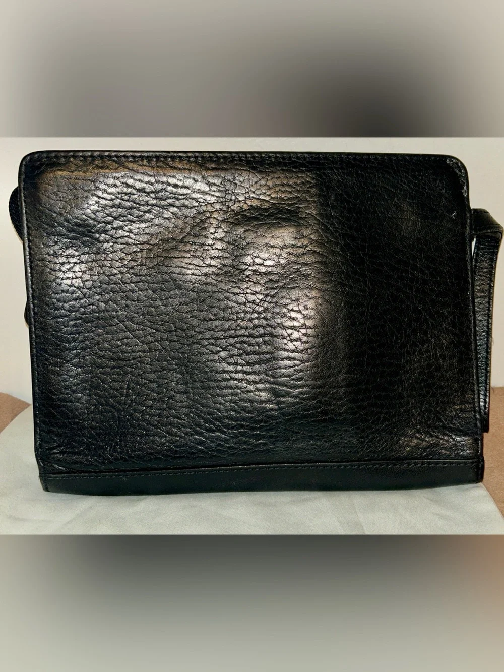 Burberrys pebbled leather crossbody / clutch bag from the pre-1999 era